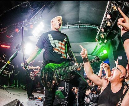Billy Biohazard on stage in USA horns